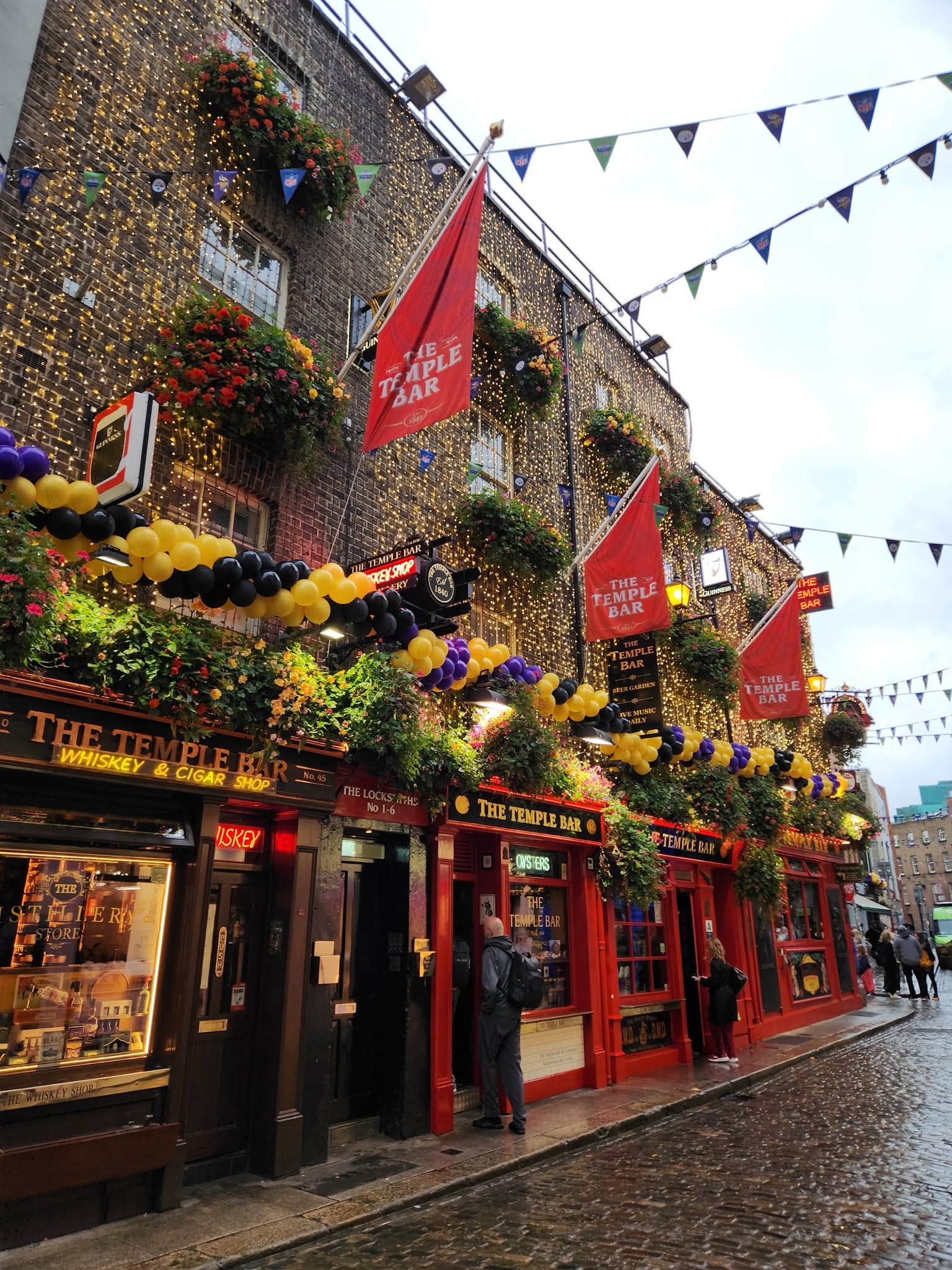 The Temple Bar, Dublin, on a wet cobbled street